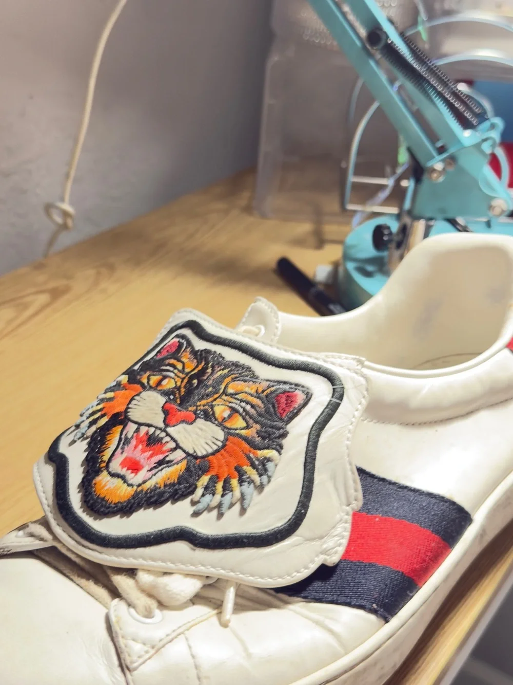 Gucci White Leather Sneakers with Red & Blue Stripe and Embroidered Patch